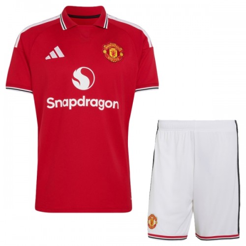 Divisa Manchester United Primo 2026-27 Maniche Corte - Bambino Divisa Manchester United Primo 2026-27 Maniche Corte - Bambino