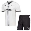 Divisa Derby County Primo 2026-27 Maniche Corte - Bambino Divisa Derby County Primo 2026-27 Maniche Corte - Bambino